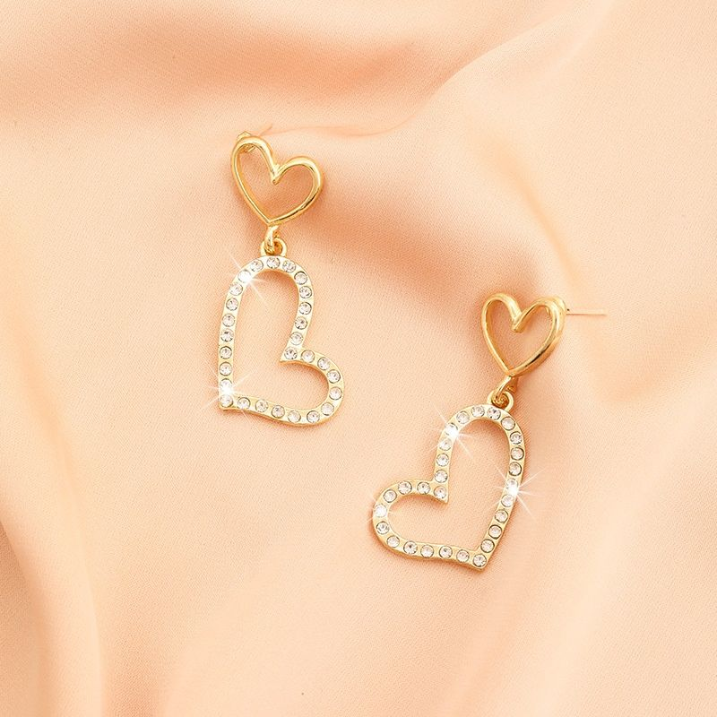 4-1.webp 18K Heart Earrings - Luxury, Niche Style, High-End, Simple, Elegant, Trendy Design, Exquisite and Small. - Image 1