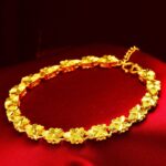 Women's Gold-Tone Lucky Four-Leaf Clover Bracelet – Featuring a 3D Openwork Clover Design and Adjustable Heart-Shaped Tag; Exquisite, Elegant Jewelry Perfect for Gifting.